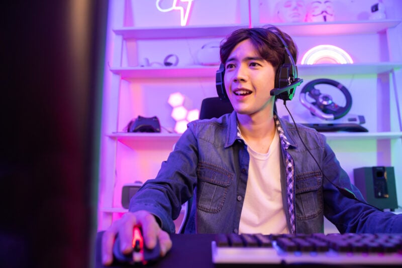 young man playing video games