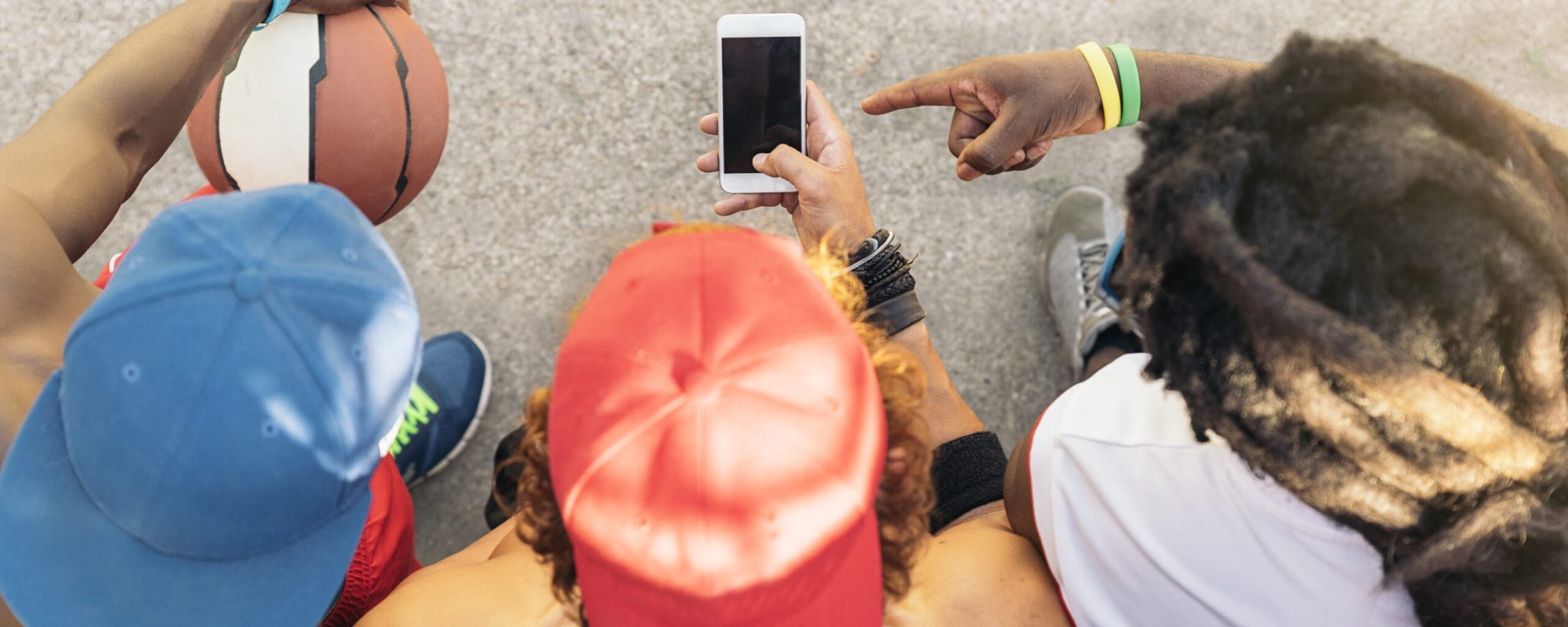 Multiethnic Friends Using Mobile.