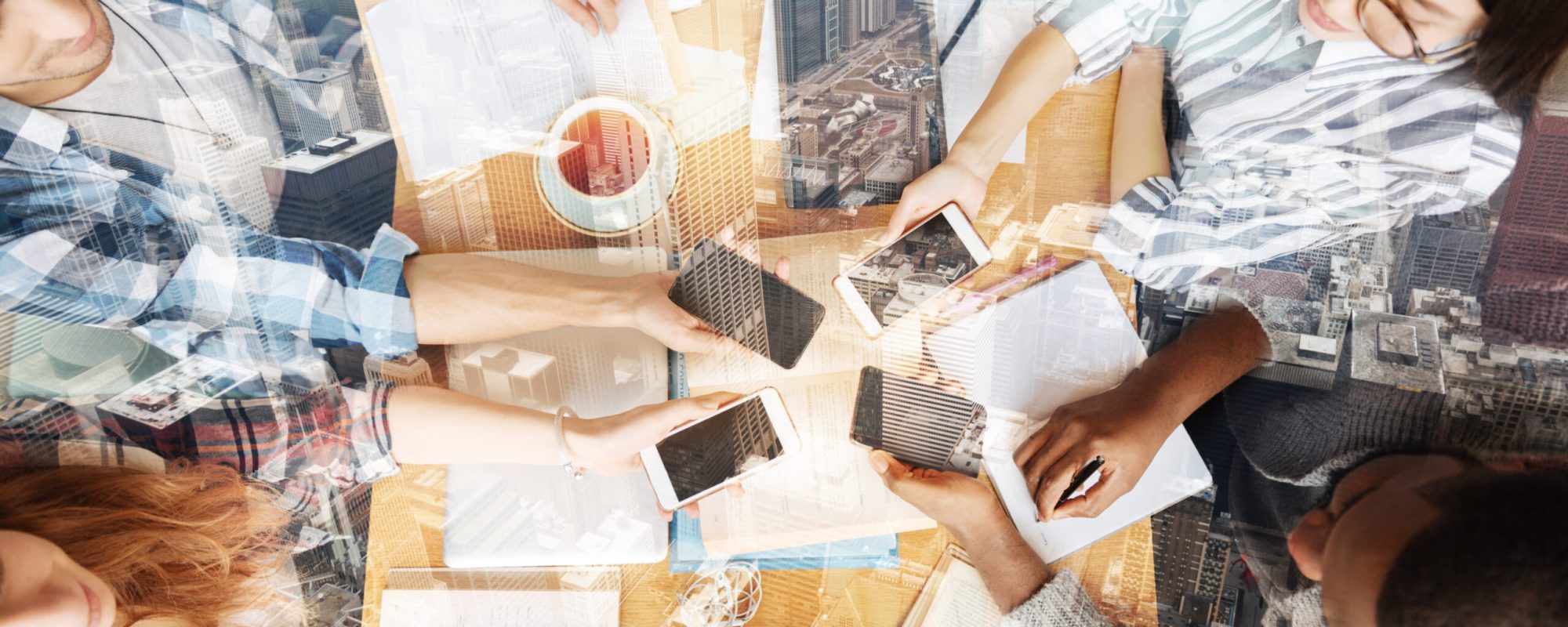 pleasant-friends-keeping-mobile-phones-together-2026-04-14-01-02-21-utc