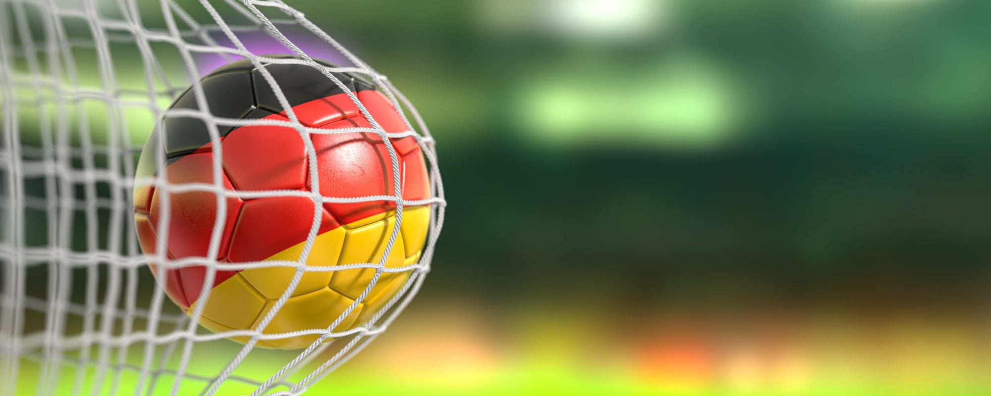 german soccer ball hitting the back of the net